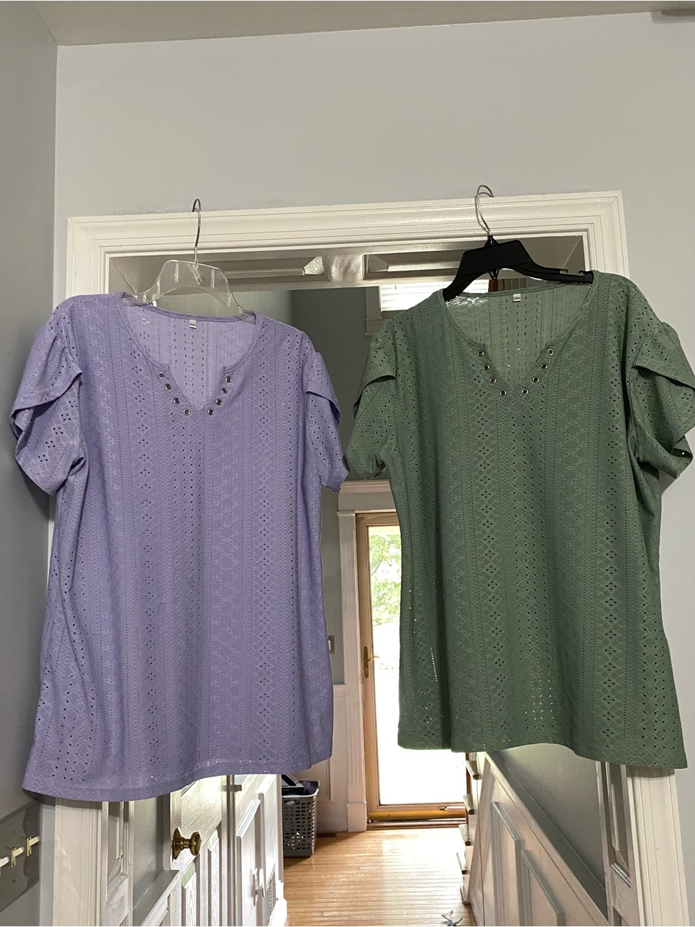Two women’s short sleeve tops
